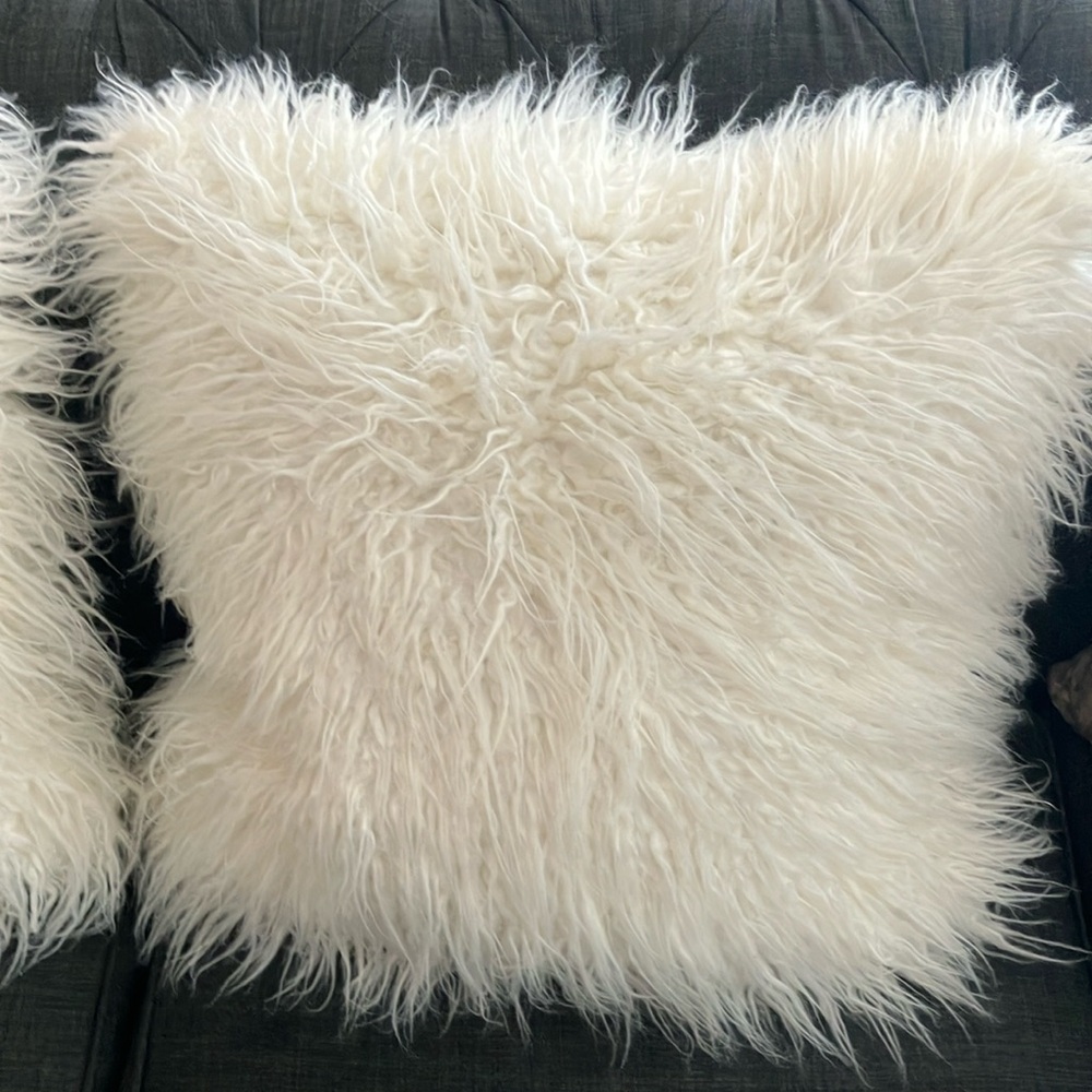 Set of two cream fringe throw pillows by Newport